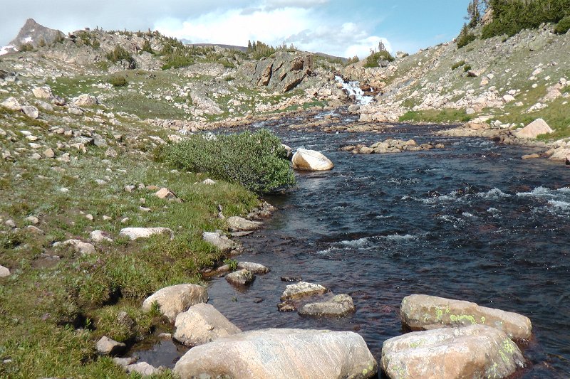26-M1110020.JPG - Sky Top Creek - feeding Lone Elk Lake.  Our camp is across the creek to the right.