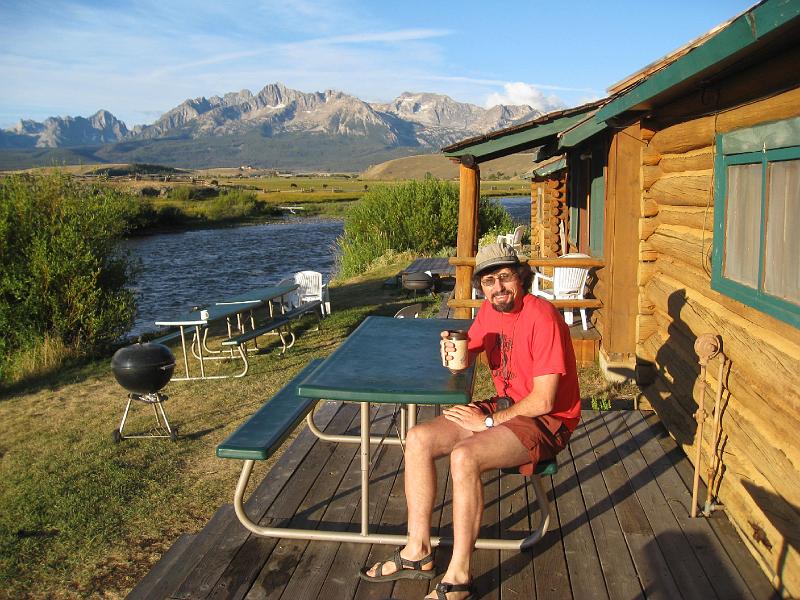 IMG_3809.jpg - Rick taking it easy at our cabin in Stanley.  As can be seen, Stanely is right on the edge of the Sawtooths.