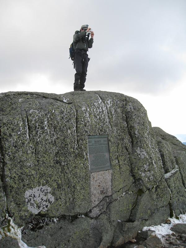 IMG_7458.jpg - Rickey Shortt at the top of Mt Marcy.  Again, windy and cold